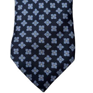 ROXY TIES blue geometric flower print on navy blue ground Italian silk tie